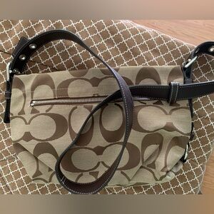 Very Gently Used - COACH Shoulder Bag. Light Purple Lining